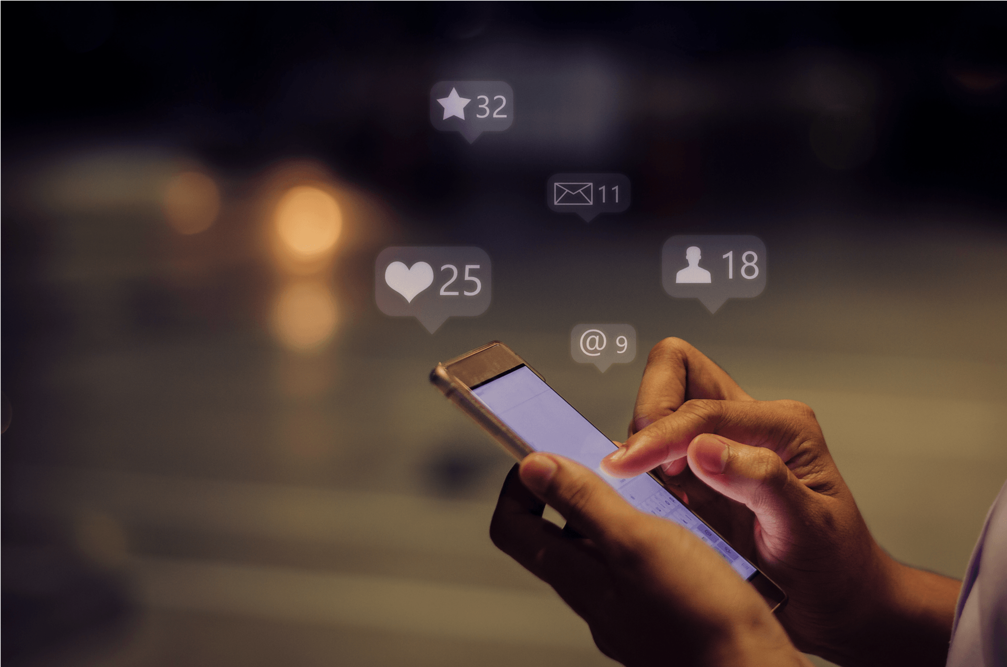Person holding mobile devise and using social media