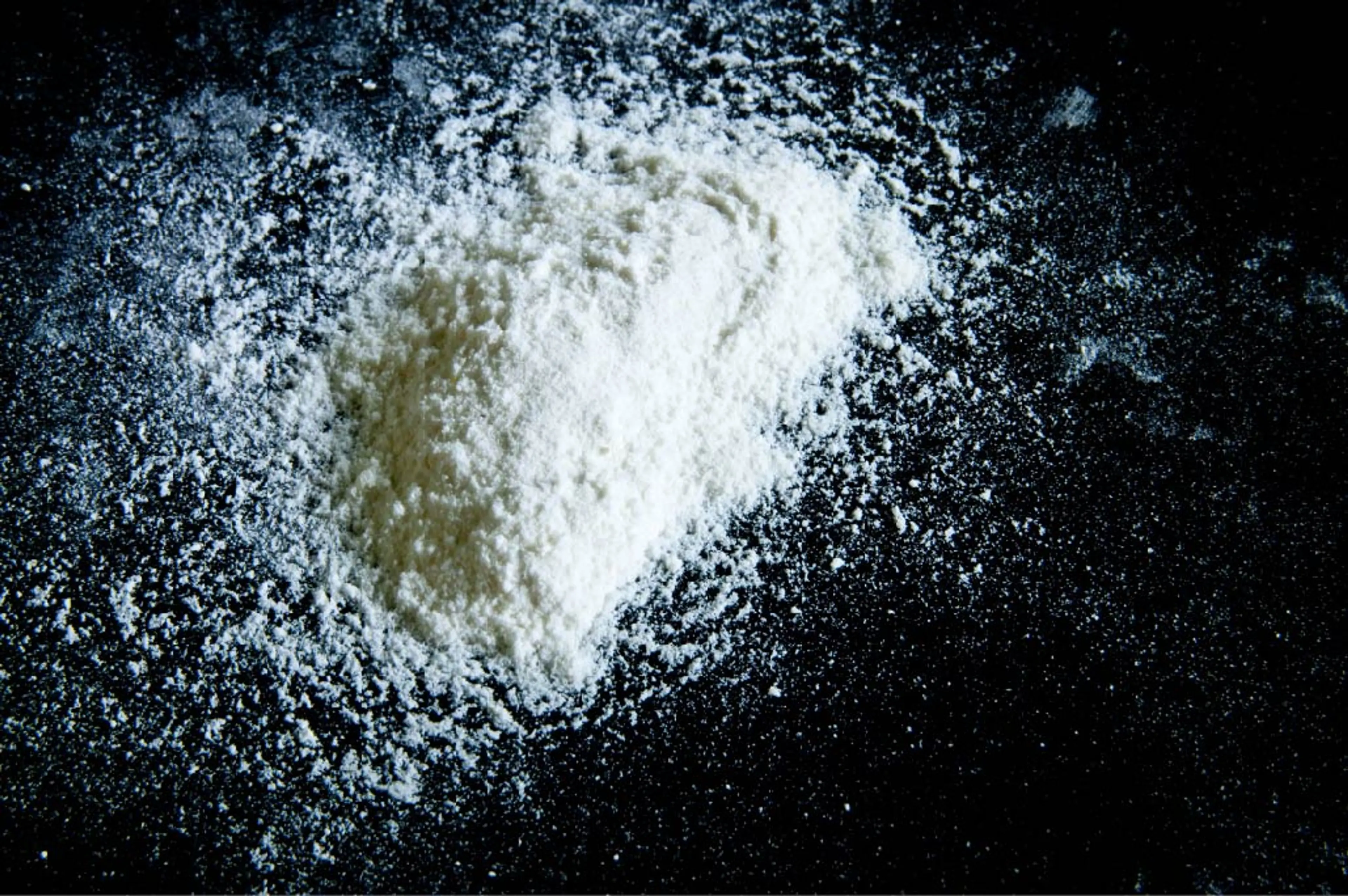 white powder on a black background